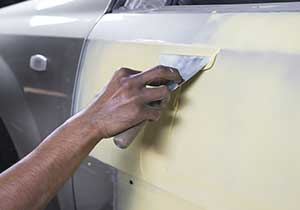 paint a car with spray can - Prime the exterior of the car